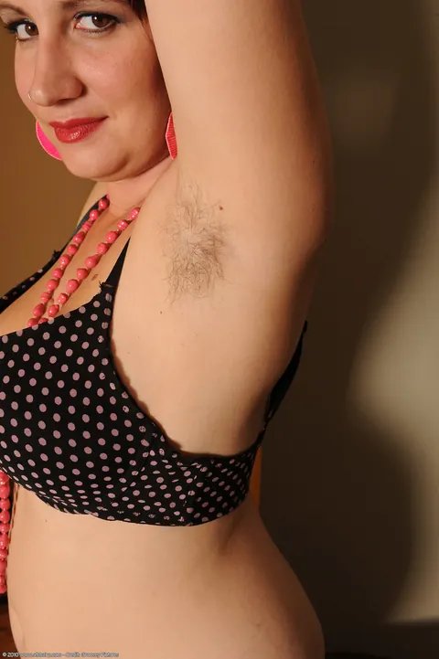 Luci Lamoore: Curvy Mature Redhead Strips to Show Her Tattoos and Hairy Pussy – photo 6 of 21