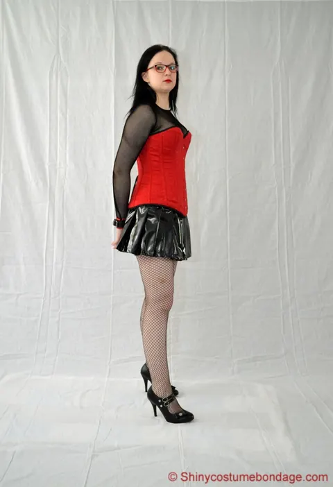 Bound Woman in a Latex Miniskirt, Pantyhose and Heels – photo 6 of 16