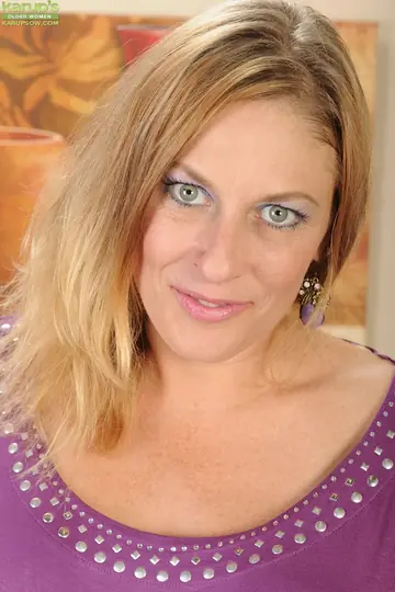 Thick Blonde MILF Undresses and Spreads Her Pussy Wide for the Camera
