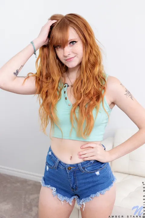 Amber Stark: Curly Redhead Strips Out of Her Shorts and Spreads Her Pussy – photo 1 of 20