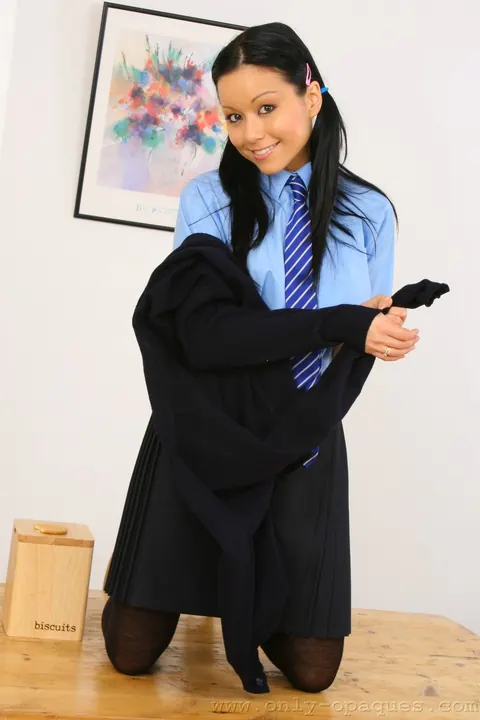 Petite Asian Babe in Uniform and Heels Spreads Her Pussy – photo 11 of 21