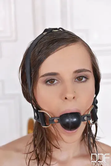 Ainara – European Brunette in Bondage Gets Oiled and Spreads