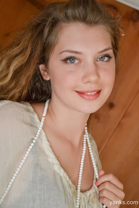 Woman Spreads Her Pussy and Teases It with Long White Beads – photo 7 of 18