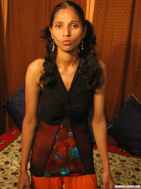 Slim Indian Woman in Pigtails Spreads Her Shaved Pussy – photo 2 of 15