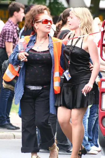 Tattooed Woman Shows Her Big Tits in Jeans and Leather Outdoors