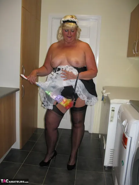 Curvy Mature Blonde Maid Strips Out of Her Uniform in the Kitchen – photo 14 of 20