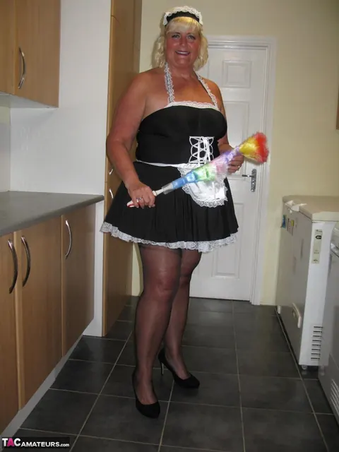 Curvy Mature Blonde Maid Strips Out of Her Uniform in the Kitchen – photo 8 of 20