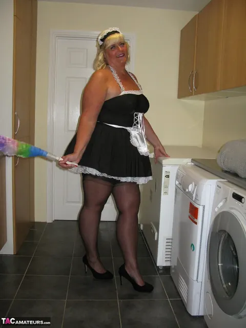 Curvy Mature Blonde Maid Strips Out of Her Uniform in the Kitchen – photo 10 of 20