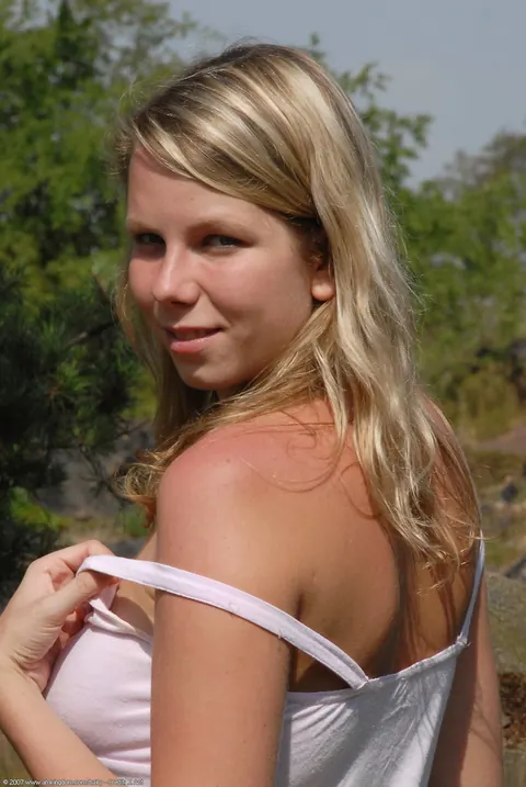 Busty Blonde Strips Out of Her Jeans Outdoors – photo 2 of 20