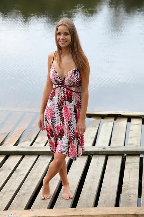 Woman Undresses and Spreads by the Dock – photo 5 of 20