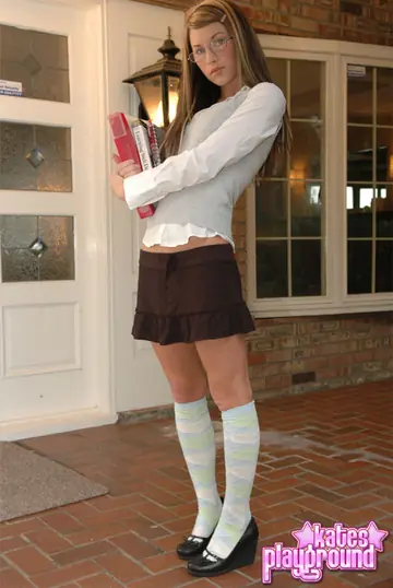Blonde in Glasses Sheds Her Skirt for Socks on the Porch