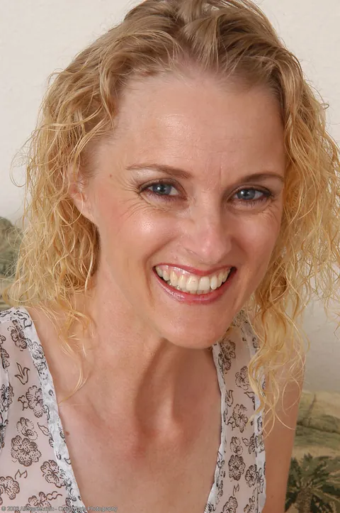 Slim Curly Blonde MILF Undresses and Spreads Her Pussy – photo 3 of 20