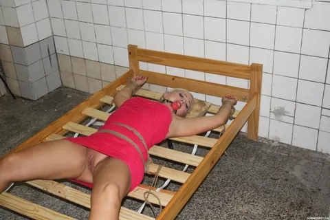Blonde Woman Tied Up and Spreads Her Legs on a Bed – photo 9 of 17