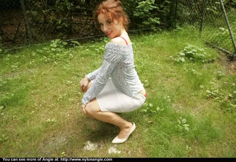 Dirty Angie: Thick Redhead MILF Shows Her Body in Stockings Outdoors – photo 9 of 12