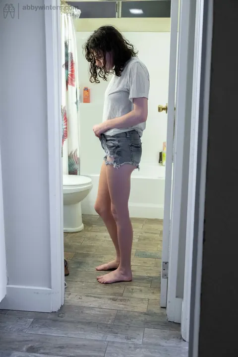 Pale Curly Brunette Spreads Her Hairy Pussy in the Bathroom – photo 13 of 16