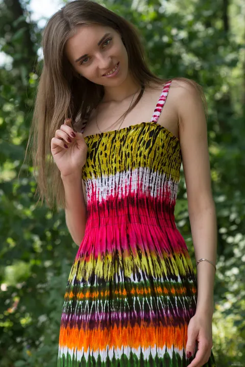 Slim Woman Strips Out of Her Dress Outdoors – photo 1 of 21