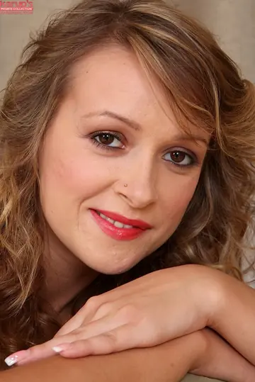 Brunette with Small Natural Tits and a Tattoo Strips and Poses