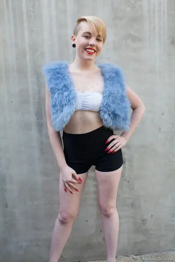 Short-Haired Blonde in Heels and Shorts Spreads Wide