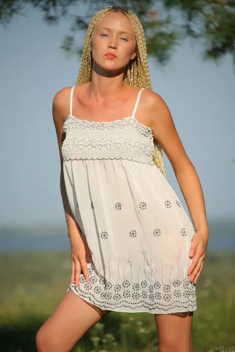 Woman Strips Out of Her Dress and Spreads Outdoors – photo 1 of 21