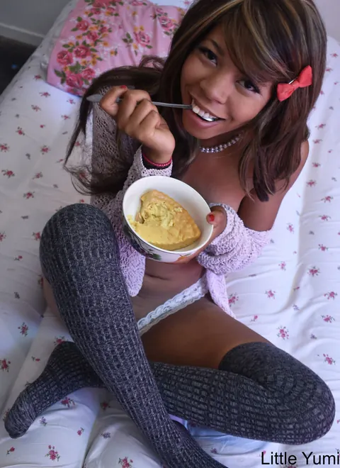 Petite Ebony Woman Shows Off in Gray Socks on the Bed – photo 11 of 15