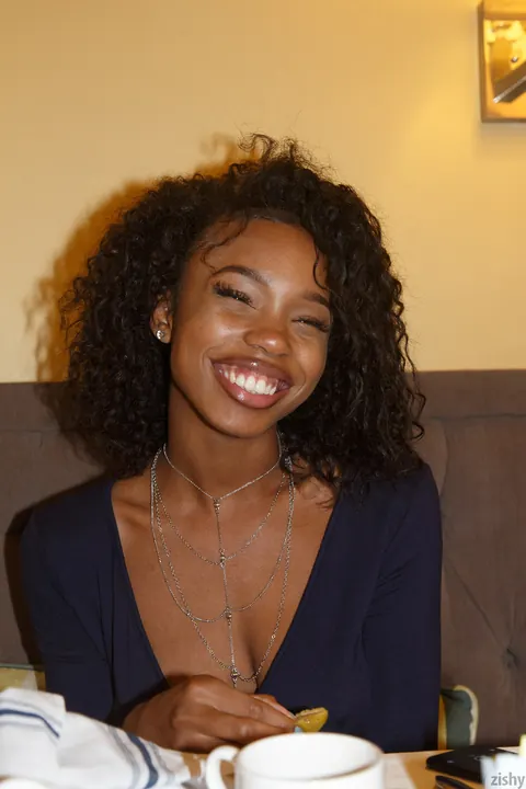Asia Amour: Petite Ebony Brunette Flashes Her Tits and Ass in a Skirt – photo 6 of 11