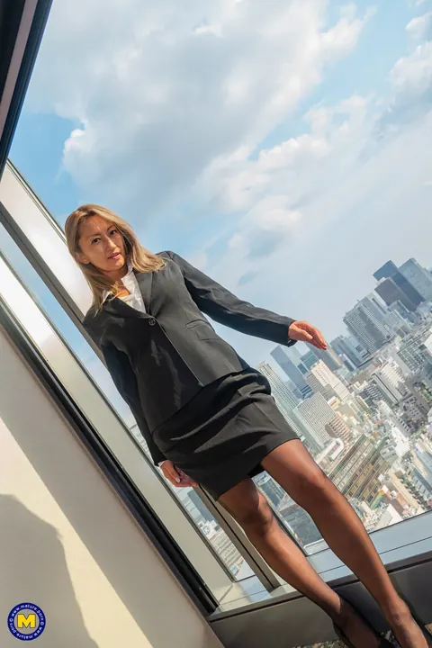 Rei Hoshino: Busty European Brunette in Uniform and Heels Spreads by the Window – photo 5 of 20