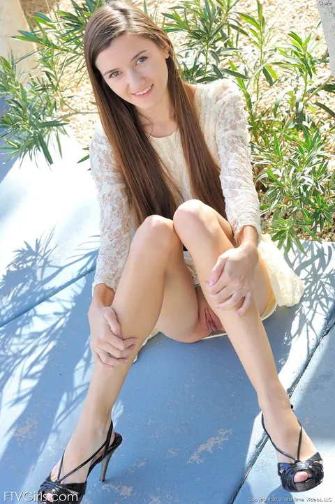Claire Evans: Slim Skinny Brunette Strips and Spreads Outdoors – photo 7 of 16