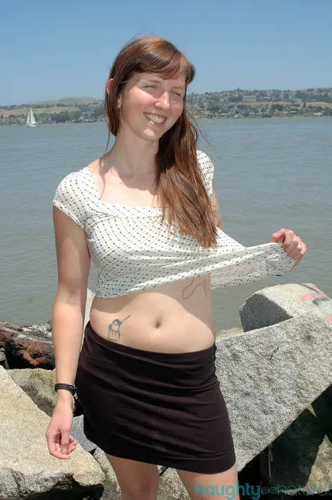 Pale Redhead Bares Her Hairy Pussy on the Beach – photo 4 of 20
