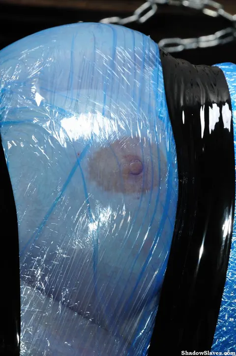 Blonde with Big Tits Stands Bound in Latex and Duct Tape – photo 11 of 12