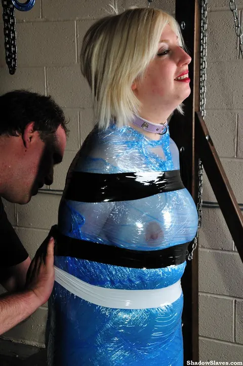 Blonde with Big Tits Stands Bound in Latex and Duct Tape – photo 12 of 12