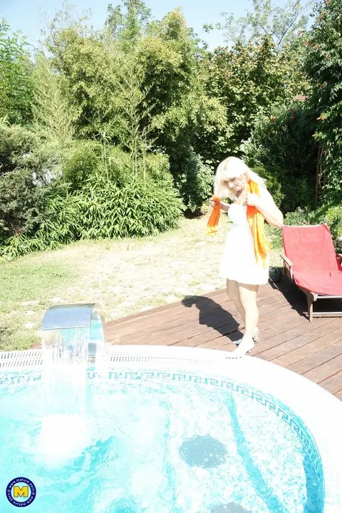 Curvy European MILF Masturbates Poolside Outdoors – photo 3 of 21