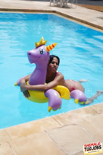 Busty Brazilian Trans Woman Strokes Her Cock to a Cumshot in the Pool