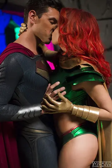 Britney Amber – Busty Redhead in Costume Takes Cum on Her Tongue