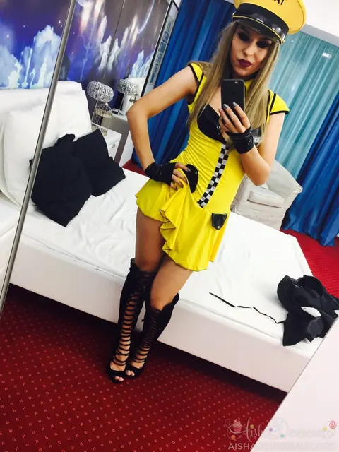 Aisha Devereaux: British Blonde in Uniform Skirt and Heels Shows Off Her Legs – photo 8 of 14