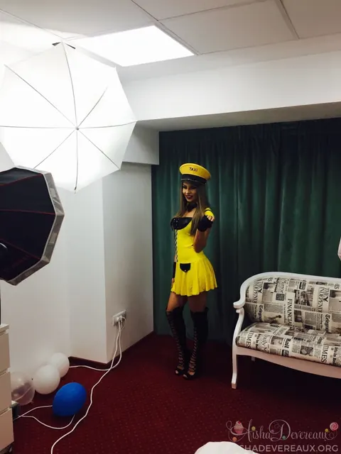Aisha Devereaux: British Blonde in Uniform Skirt and Heels Shows Off Her Legs – photo 14 of 14