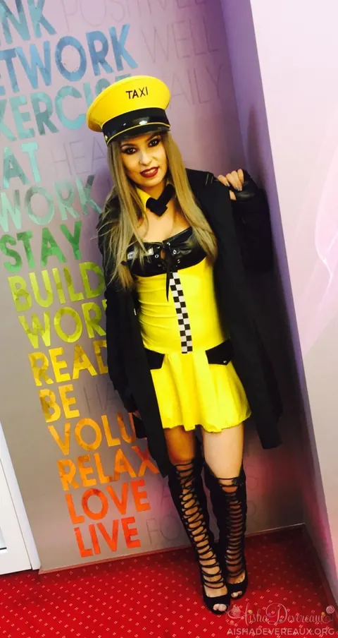 Aisha Devereaux: British Blonde in Uniform Skirt and Heels Shows Off Her Legs – photo 12 of 14