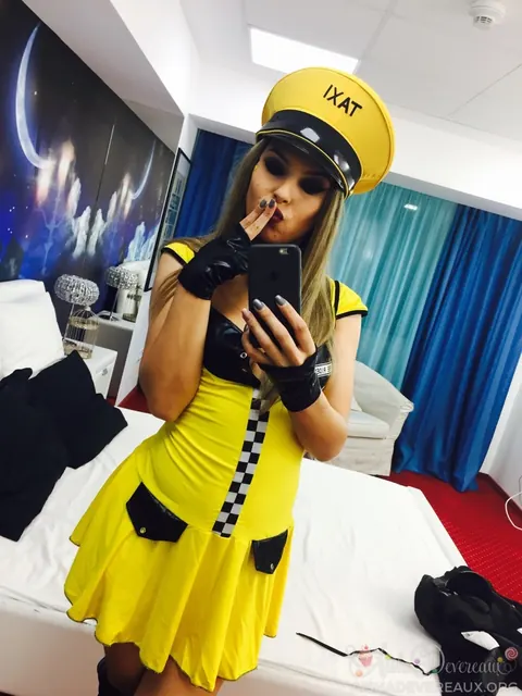 Aisha Devereaux: British Blonde in Uniform Skirt and Heels Shows Off Her Legs – photo 9 of 14