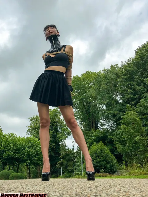 Asian Woman Bound in a Skirt and Heels in Public Park – photo 8 of 16