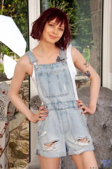 Slim Petite Redhead Undresses and Spreads Her Pussy