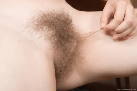 Short-Haired Amateur Pulls Her Panties Aside to Show Her Hairy Pussy – photo 13 of 16