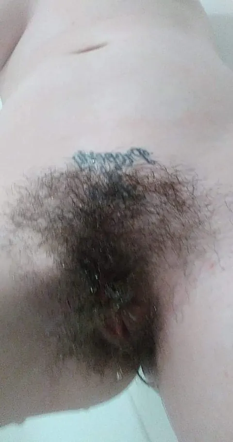 Busty Brunette Reveals Her Hairy Pussy in the Bathroom – photo 9 of 14