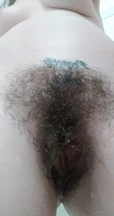 Busty Brunette Reveals Her Hairy Pussy in the Bathroom – photo 6 of 14