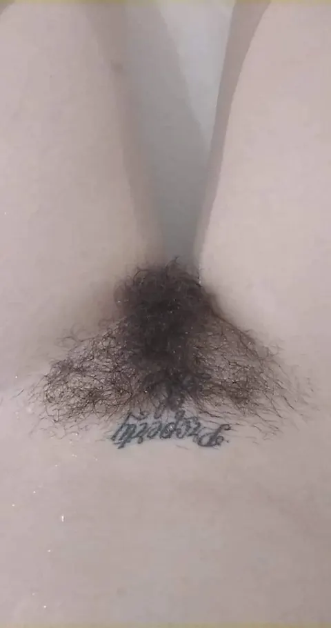 Busty Brunette Reveals Her Hairy Pussy in the Bathroom – photo 13 of 14