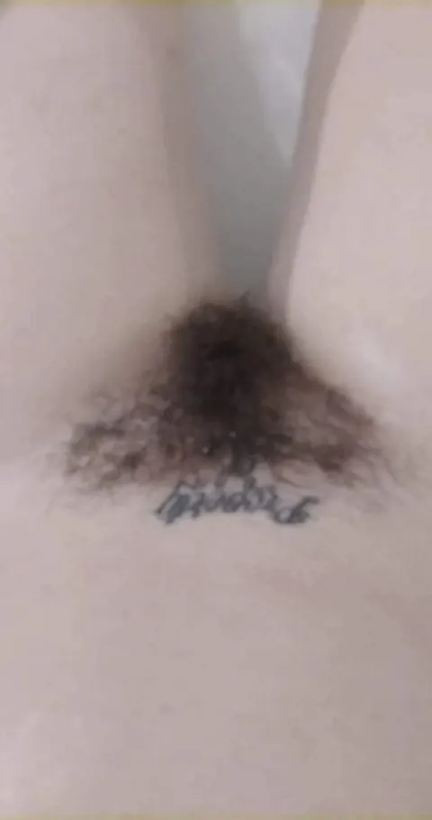 Busty Brunette Reveals Her Hairy Pussy in the Bathroom – photo 12 of 14
