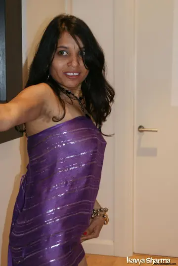 Brunette Indian MILF Lifts Her Skirt to Show Off Her Legs