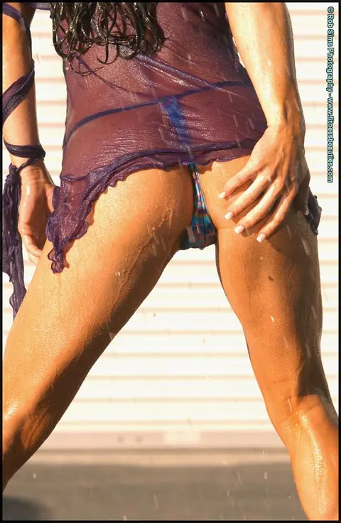 Loretta Lynn: Busty Brunette Soaks Her Lingerie and Skirt with a Garden Hose – photo 4 of 15