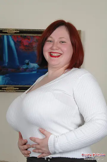 Redhead BBW in Stockings Spreads Her Shaved Pussy