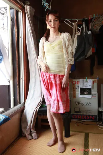 Thick Japanese Redhead Bares All in Tan Stockings by the Window