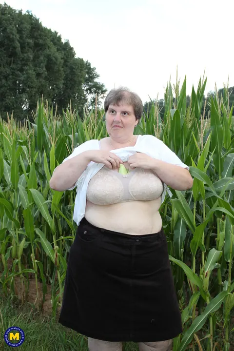 Thick European MILF Strips and Fingers Her Pussy in a Corn Field – photo 1 of 21