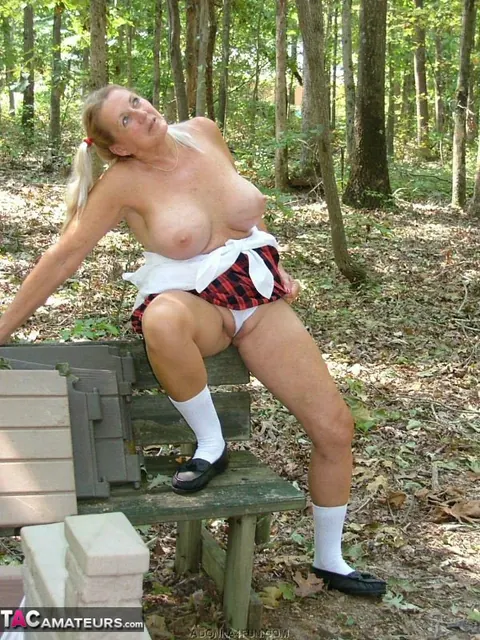 Blonde MILF in Uniform Spreads Her Pussy in the Forest – photo 19 of 19
